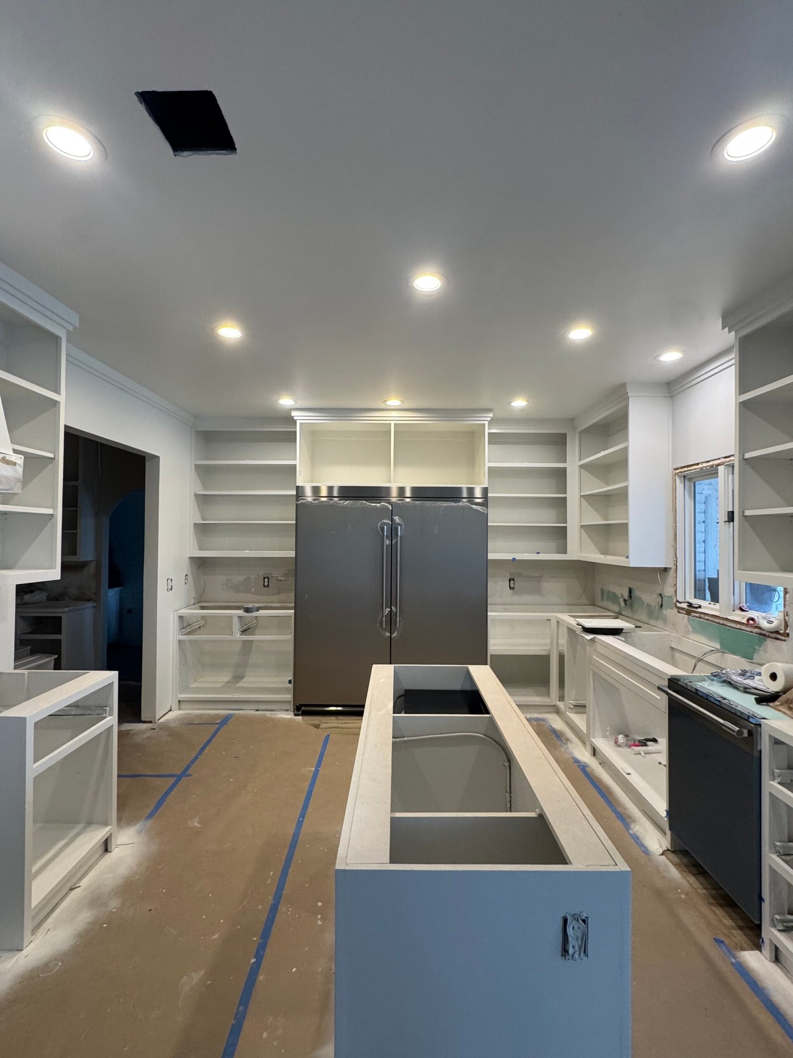Modern kitchen cabinet installation in Tulsa by Knockout Property Services